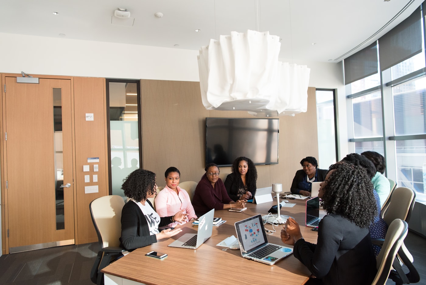 Colleagues in a boardroom meeting